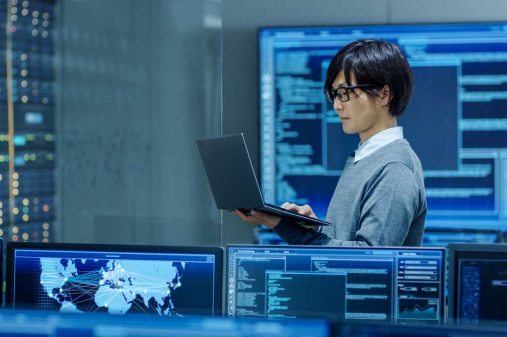 japan-control-center-man-computer-monitor-data-center