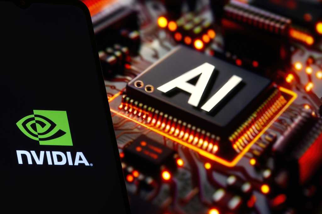 NVIDIA logo on phone and blurred AI chip on the background, USA, February 15, 2024